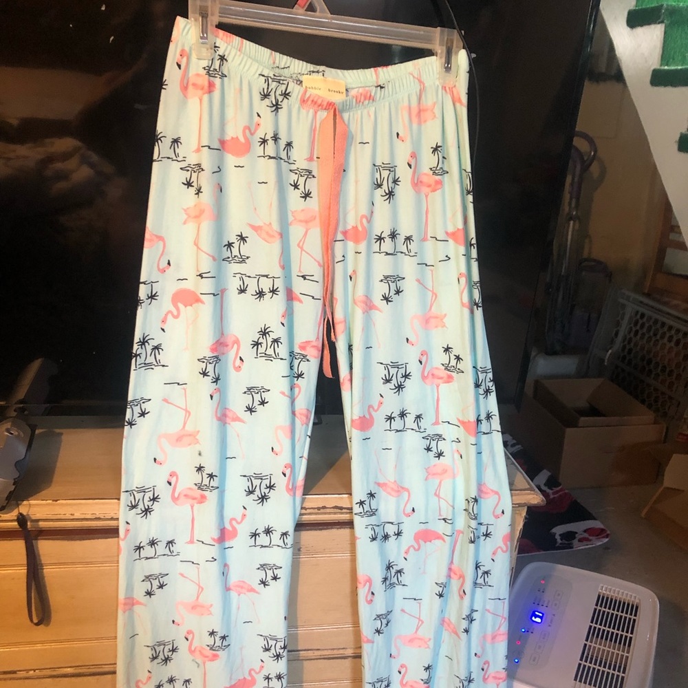 Pink flamingo/black palm tree pajama bottoms. Small. Never worn. Aqua.